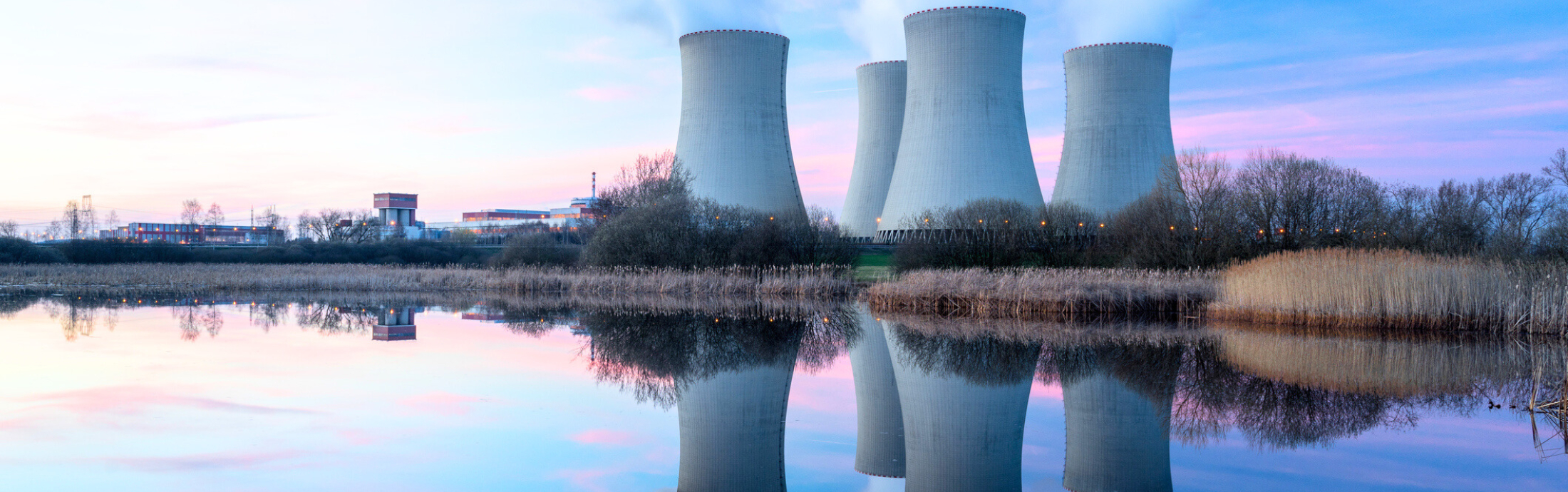 A nuclear power plant with big chimneys.
