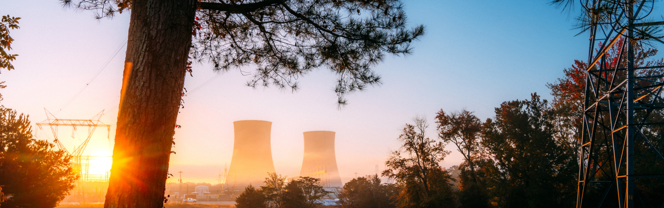Sunrise with nuclear power plants in the distance