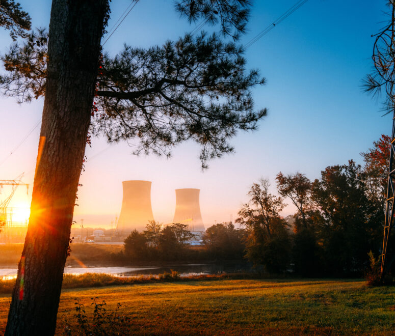 Sunrise with nuclear power plants in the distance