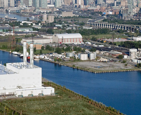 Portland skyline with picture of factory and water