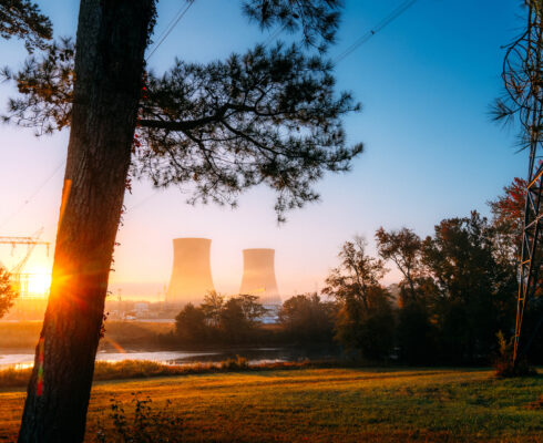 Sunrise with nuclear power plants in the distance