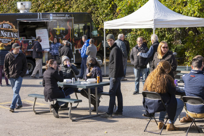 Food truck and people eating