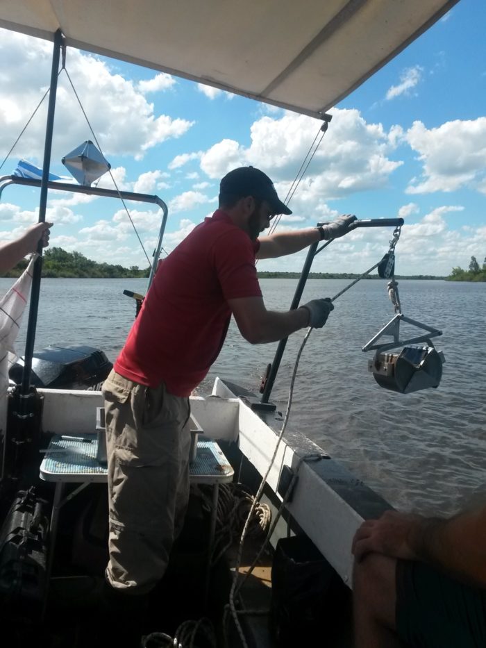 The ponar sediment sampler is lowered to the bottom.