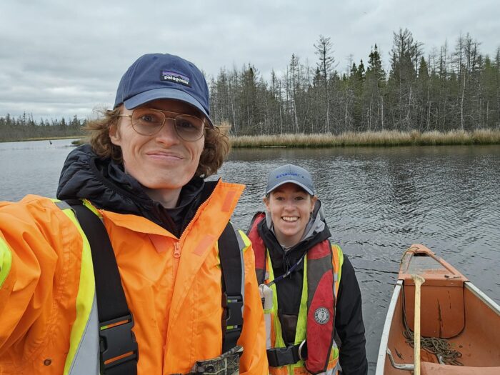 Allison in the field, on the water, with our Environmental Scientist Duncan McDonald.